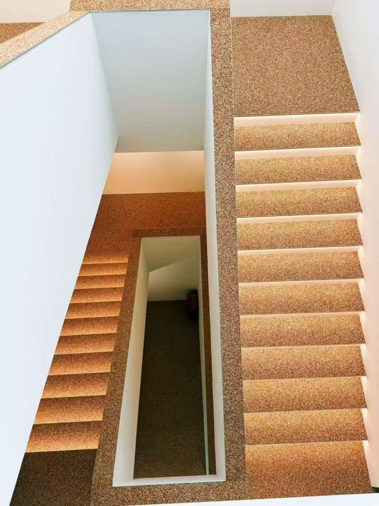 Micro-stone finish on interior stairs